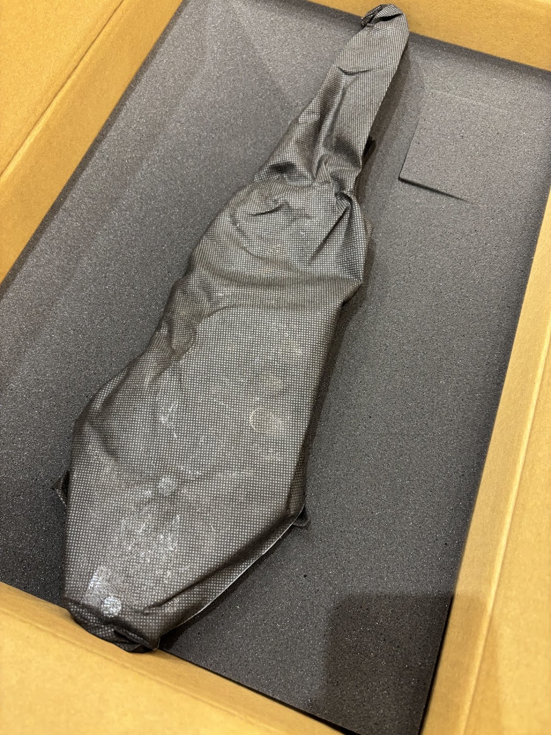 黒い袋の中に…