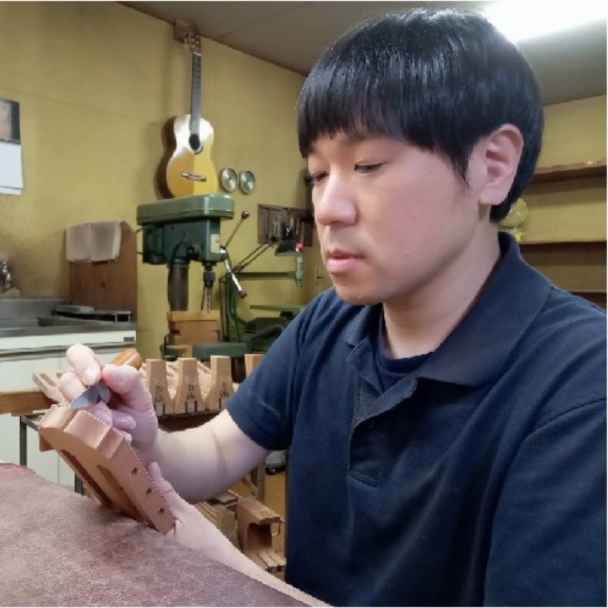 河野ギター製作所工場長齋藤勝(さいとう まさる)
