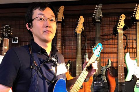 スタッフ写真 管楽器・弦楽器担当 関谷