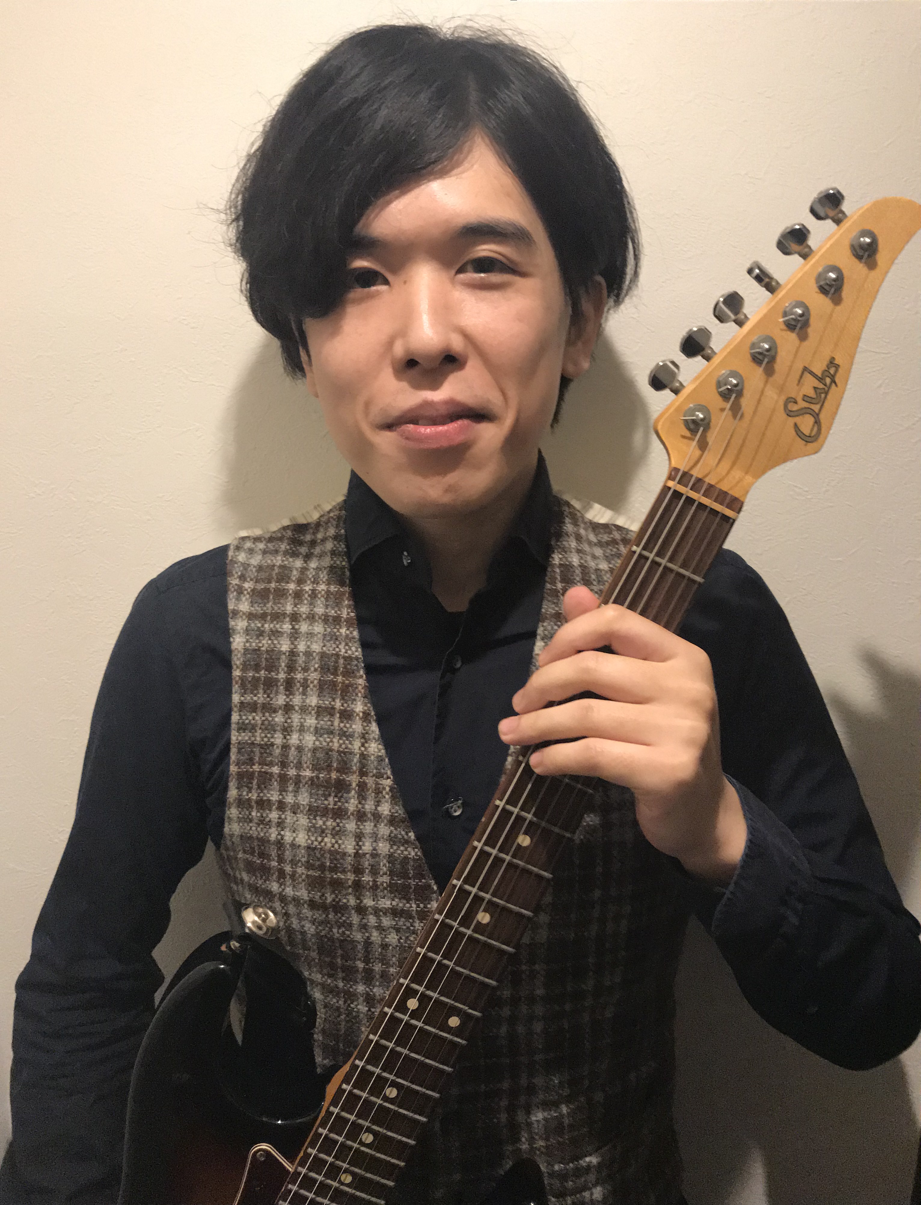 ギター講師新田 真一郎