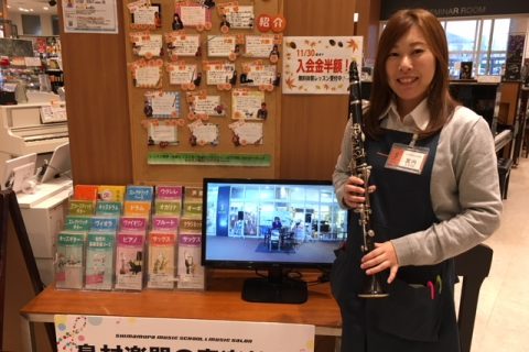 スタッフ写真 管楽器アドバイザー(社内資格)、弦楽器 宮内