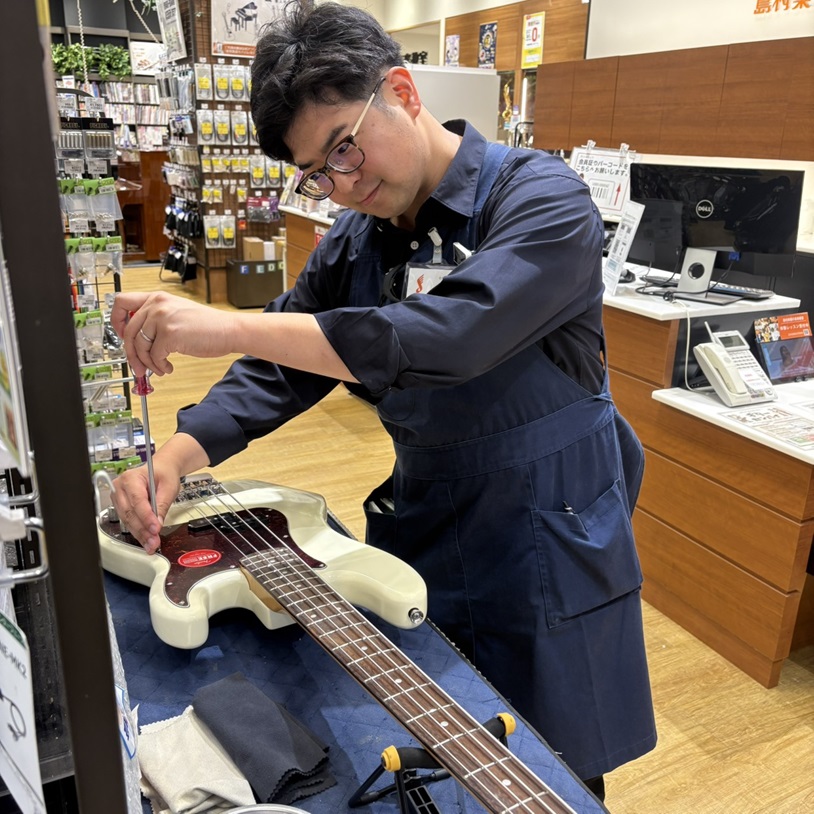 ギター担当佐藤　拡