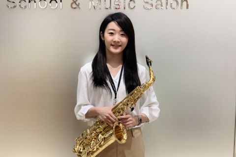 スタッフ写真 サックスインストラクター 田中