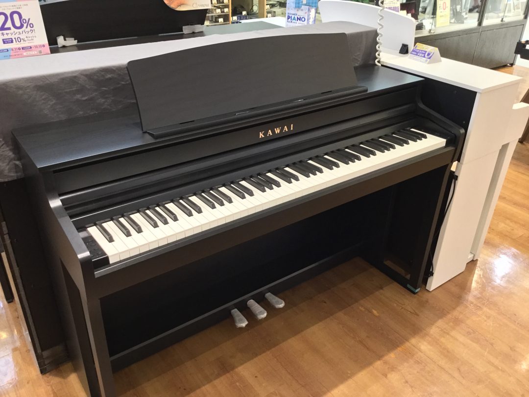 ■カワイ　SCA401
・黒木目調
・￥209,000