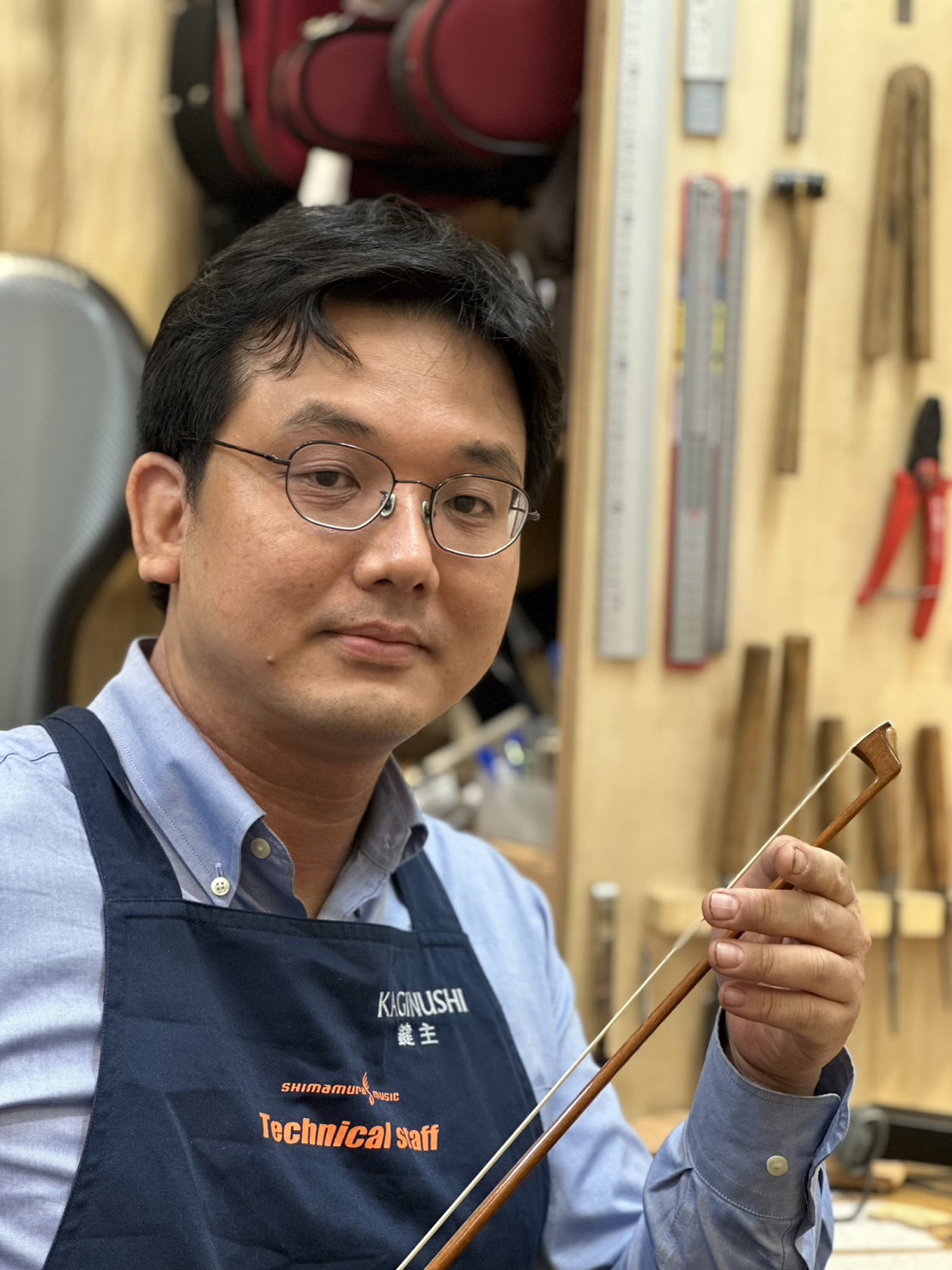 弦楽器リペアマン・鍵主